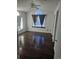 Bright bedroom with dark wood floors, vaulted ceiling, window, and ceiling fan at 84 S Carlton St, Castle Rock, CO 80104