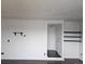 Bright living room with sleek floors and minimalist wall mounted shelves at 84 S Carlton St, Castle Rock, CO 80104