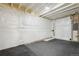 Unfinished basement space with plastic covering and flooring at 1030 W Hopkins Dr, Elizabeth, CO 80107