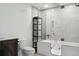 Basement bathroom with walk-in shower and a walk-in bathtub at 1030 W Hopkins Dr, Elizabeth, CO 80107