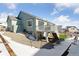 Home exterior with deck, patio, and sloping yard at 1030 W Hopkins Dr, Elizabeth, CO 80107