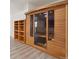 Indoor sauna provides a private spot for relaxation with bright lighting and an adjacent bookshelf at 1030 W Hopkins Dr, Elizabeth, CO 80107