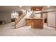 Basement wet bar area complete with mini fridge and lots of storage at 5723 S Everett Way, Littleton, CO 80123