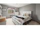 Bedroom featuring a queen size bed and gray walls at 5723 S Everett Way, Littleton, CO 80123