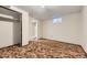 Bedroom with closet and carpet. Has an adjacent bathroom with a stand up shower at 649 Nucla Way, Aurora, CO 80011