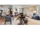 Spacious living room with a large area rug and comfortable seating at 649 Nucla Way, Aurora, CO 80011