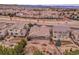 Beautiful aerial view of a home with a stone patio, manicured backyard, and a well-maintained community at 2342 Bellavista St, Castle Rock, CO 80109
