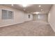 Spacious finished basement with multiple windows providing natural light at 2342 Bellavista St, Castle Rock, CO 80109