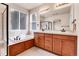 Bathroom features a double vanity with dark wood cabinets, and a large soaking tub at 2342 Bellavista St, Castle Rock, CO 80109