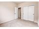 Bedroom featuring closet and doorway, neutral carpet and paint at 2342 Bellavista St, Castle Rock, CO 80109