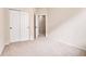 Bedroom featuring closet and doorway, neutral carpet and paint at 2342 Bellavista St, Castle Rock, CO 80109