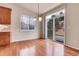 Bright dining area with hardwood floors and sliding glass doors to the outdoor patio at 2342 Bellavista St, Castle Rock, CO 80109