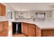 Lovely kitchen area with a modern sink, ample counter space, and stylish cabinetry at 2342 Bellavista St, Castle Rock, CO 80109