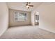 Spacious main bedroom with neutral carpet and vaulted ceiling at 2342 Bellavista St, Castle Rock, CO 80109