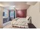 Basement bedroom with large tapestry and dresser at 209 S Pembrook St, Castle Rock, CO 80104