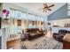 Open living space with hardwood floors, recessed lighting, and comfortable seating at 209 S Pembrook St, Castle Rock, CO 80104