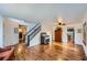 Hardwood floors, staircase, and vintage jukebox at 209 S Pembrook St, Castle Rock, CO 80104