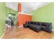 Spacious living room features vaulted ceilings, hardwood floors, and a modern chandelier at 1241 S Akron Way, Denver, CO 80247