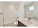 Bright bathroom showcasing a tub, and a vanity with a stylish mirror and fixtures at 10863 E Hinsdale Cir, Centennial, CO 80112