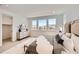 Stylish bedroom with large windows, a plush rug, and comfortable, inviting decor at 10863 E Hinsdale Cir, Centennial, CO 80112