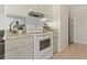 Well-equipped kitchen with white appliances, great counter space and storage at 7309 W Hampden Ave # 6103, Lakewood, CO 80227