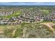 Expansive aerial view of a well-established suburban community featuring lush greenery and winding streets at 11074 Grayledge Cir, Highlands Ranch, CO 80130