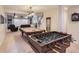 Game room with a pool table and foosball table at 11074 Grayledge Cir, Highlands Ranch, CO 80130