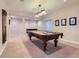 Recreation room with a pool table and natural light at 11074 Grayledge Cir, Highlands Ranch, CO 80130