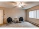 Bedroom with a ceiling fan and a window at 3184 S Heather Gardens Way # 107, Aurora, CO 80014