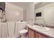 Bathroom with walk-in bathtub, toilet and vanity at 5833 N Biscay St, Denver, CO 80249