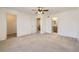 Spacious bedroom with ensuite bathroom access and walk-in closet at 5833 N Biscay St, Denver, CO 80249