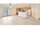 Kitchen with light wood cabinets and an island at 5833 N Biscay St, Denver, CO 80249