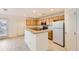Eat-in kitchen with ample cabinetry at 5833 N Biscay St, Denver, CO 80249