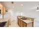Kitchen with stainless steel sink and island at 5833 N Biscay St, Denver, CO 80249