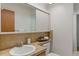Cozy bathroom with updated vanity, sink, and stylish mirror at 1420 E Bates Ave, Englewood, CO 80113