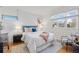 Cozy bedroom featuring a comfortable bed, modern nightstands, and neutral decor with a window at 1420 E Bates Ave, Englewood, CO 80113