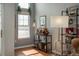 Stylish bar area featuring hardwood floors, bright natural light and a modern bar at 3242 E 103Rd Dr # 602, Thornton, CO 80229