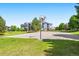 Community basketball court with well-maintained surface, hoop, and surrounding green space, perfect for recreation and exercise at 3242 E 103Rd Dr # 602, Thornton, CO 80229