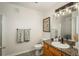 Clean bathroom featuring a stylish vanity, granite countertops, and modern fixtures at 3242 E 103Rd Dr # 602, Thornton, CO 80229