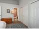 Spacious bedroom offering ample closet space and access to the ensuite bathroom at 3242 E 103Rd Dr # 602, Thornton, CO 80229