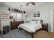 Bright bedroom featuring a comfortable bed, soft carpeting, and ample natural light at 3242 E 103Rd Dr # 602, Thornton, CO 80229