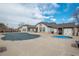 Outdoor community pool and hot tub, covered for the off-season, offering a serene and relaxing recreational amenity at 3242 E 103Rd Dr # 602, Thornton, CO 80229