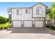Inviting townhome featuring a private garage and well-maintained landscaping at 3242 E 103Rd Dr # 602, Thornton, CO 80229