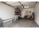 Spacious two car garage with an organized shelving system along the back wall at 3242 E 103Rd Dr # 602, Thornton, CO 80229