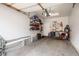 Organized two-car garage with ample storage space and a clean, well-maintained interior, ready for vehicles and projects at 3242 E 103Rd Dr # 602, Thornton, CO 80229