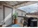 Relaxing covered patio area with string lights and a grill for outdoor enjoyment at 3242 E 103Rd Dr # 602, Thornton, CO 80229