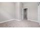 Neutral bedroom featuring carpet and walls, a walk-in closet, and natural light at 2733 W 28Th Ave # 6, Denver, CO 80211