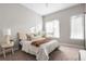 Cozy main bedroom with a comfortable bed, soft linens, and natural light from windows at 2733 W 28Th Ave # 6, Denver, CO 80211