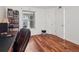 Comfortable home office featuring a desk, an ergonomic chair, and a bookshelf with a view at 6755 S Ivy St # A7, Centennial, CO 80112