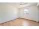 Spacious bedroom with hardwood flooring and a window at 9256 W Euclid Ave, Littleton, CO 80123